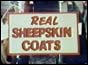 Real sheepskin coats sign in shop window