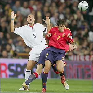 Rio Ferdinand has the task of keeping out two of the world's top strikers