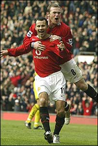 Giggs and Rooney celebrate United's opening goal