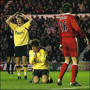 John Arne Riise (left) and Kewell are dejected as a chance goes begging