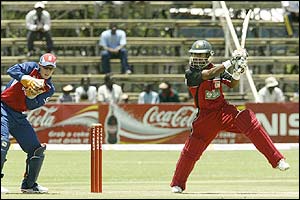Dion Ebrahim swings at a wide delivery