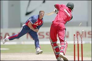 England's Darren Gough bowls Zimbabwe's Chris Mpofu 