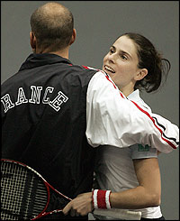 France's Nathalie Detchy celebrates with captain Guy Forge