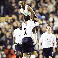 Defoe gives Tottenham a 1-0 lead but is booked for his celebration and is suspended for the next match