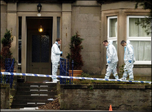 Officers outside the house in Nairn