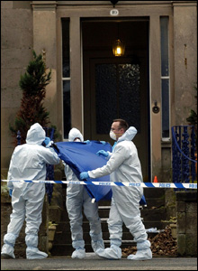 Officers outside the house were Mr Wilson was shot