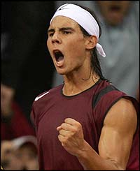 Nadal celebrates winning the second set