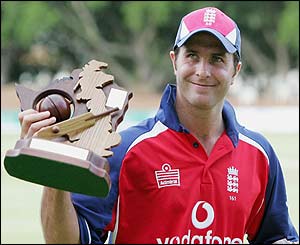 England captain Michael Vaughan holds the series trophy aloft