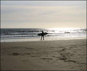 A lone surfer on Southerndown beach in the evening (Richard Gilliatt from Rhoose)