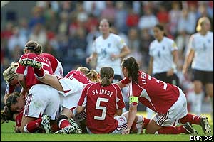 Denmark's players celebrate the dramatic win over England