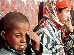 Distressed Algerian children following a massacre