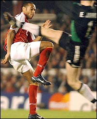 Thierry Henry puts Arsenal 2-0 up in front of the Clock End