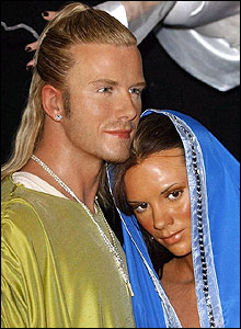 Posh and Becks are dressed as Mary and Joseph
