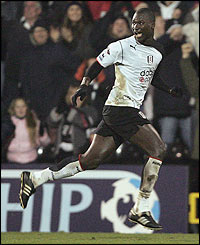 Papa Bouba Diop celebrates scoring the equaliser for Fulham