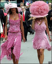 Two ladies dress for the day in pink