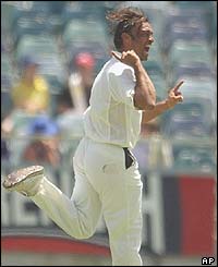 Shoaib Akhtar celebrates the wicket of Australia's Matthew Hayden