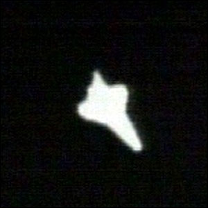 Outline of the Discovery space shuttle on re-entry