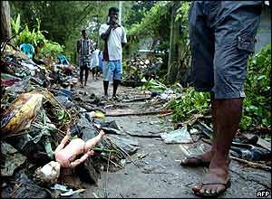Toy doll amid tsunami debris