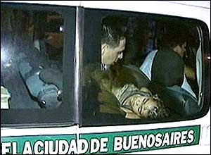 Injured club-goers are taken away in an ambulance