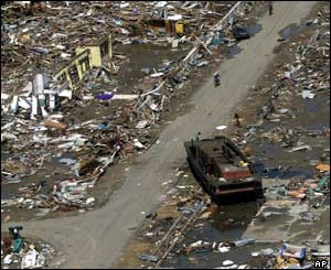 A barge sits on the road amidst the debris in Meulaboh, 2 Jan