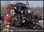 Mangled remains of the bus after it was attacked