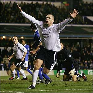 Kevin Nolan wheels away after scoring