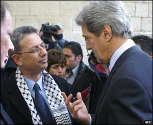 Candidate Mustafa Barghouti and former US presidential candidate John Kerry outside a polling station in Ramallah
