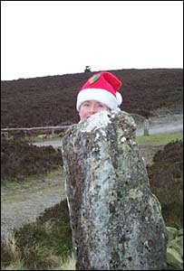 Janice Roberts from Buckley posing behind a post on Moel Fammau, nr Mold, Flintshire (Alan Ellson)