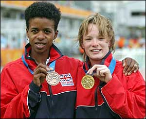 Candy Hawkins (left) and Lauren Peffers with their bronze and gold medals