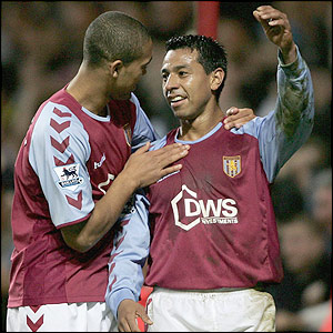 Nolberto Solano celebrates his goal