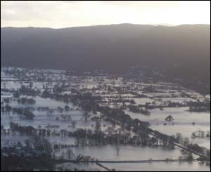 Floods in the Conwy Valley, photographed by Lowri Wyn Griffiths, from Tal-y-Bont