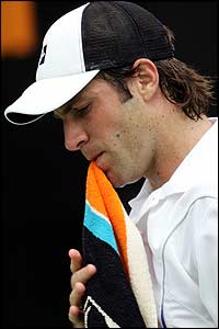 Greg Rusedski loses the first set in a tough encounter with Sweden's Jonas Bjorkman