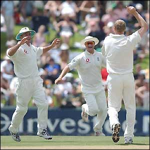 Graham Thorpe and Robert Key congratulate Andrew Flintoff on taking the opening wicket