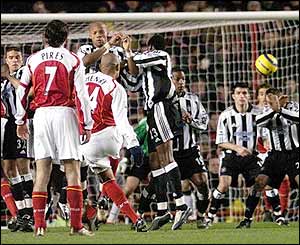 Thierry Henry takes a free-kick