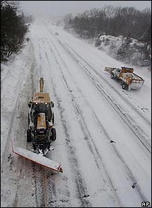 Snowploughs clear Route 128 in Gloucester, Massachusetts