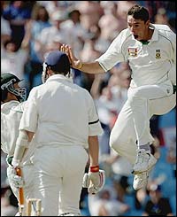 Ashley Giles is dismissed by Andre Nel for 