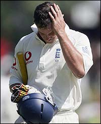 Andrew Strauss returns to the pavilion after his dismissal