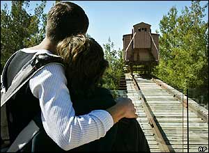 Two students look at a display at the Yad Vashem museum in Jerusalem