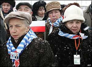 Survivors of the Auschwitz death camp, wearing scarves in the colours of the Israeli flag