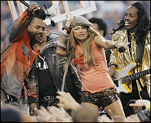Hip hop group the Black Eyed Peas perform before the Super Bowl
