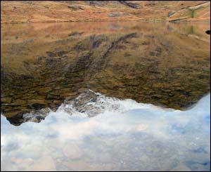 A reflected view of Twll Du's cliffs and snowy tops (Mathew and Jayne Neal)