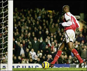 Patrick Vieira has an easy fourth goal for the Gunners after a mix-up in the Palace defence