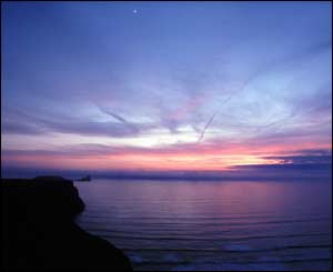 Dai Bevan from Garnant took this shot of sunset at Worms head on the Gower