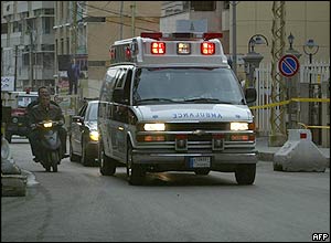 Ambulance carrying the body of Rafik Hariri through the streets of Beirut