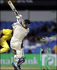 Jeff Wilson is bowled by Glenn McGrath