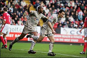 Nikos Dabizas wheels away after his goal