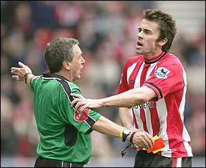 Referee Alan Wiley dismisses Southampton's David Prutton