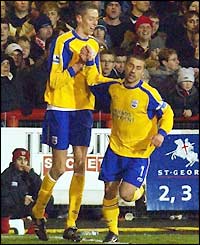 Peter Crouch is congratulated by strike partner Kevin Phillips after his equaliser