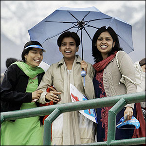 Visiting Pakistan fans wrap up warm and put on a smile