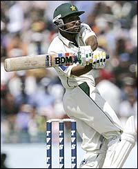 Pakistan's Asim Kamal plays an attacking stroke